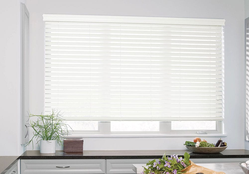 White blinds on kitchen windows