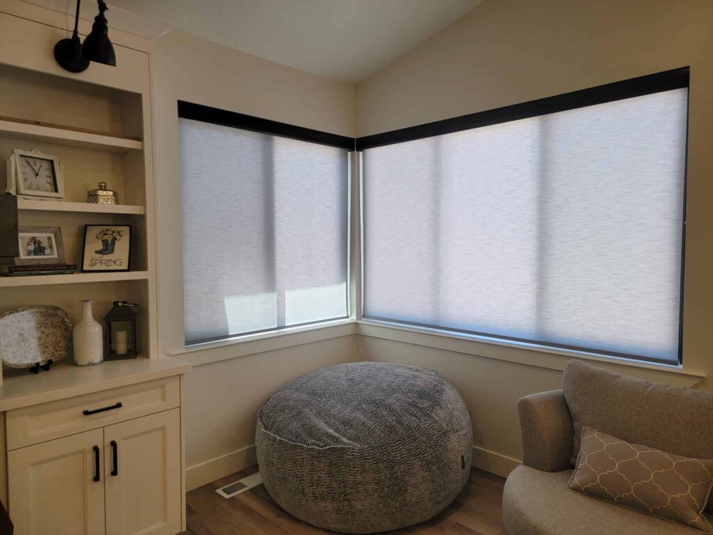Closed shades on windows in bedroom