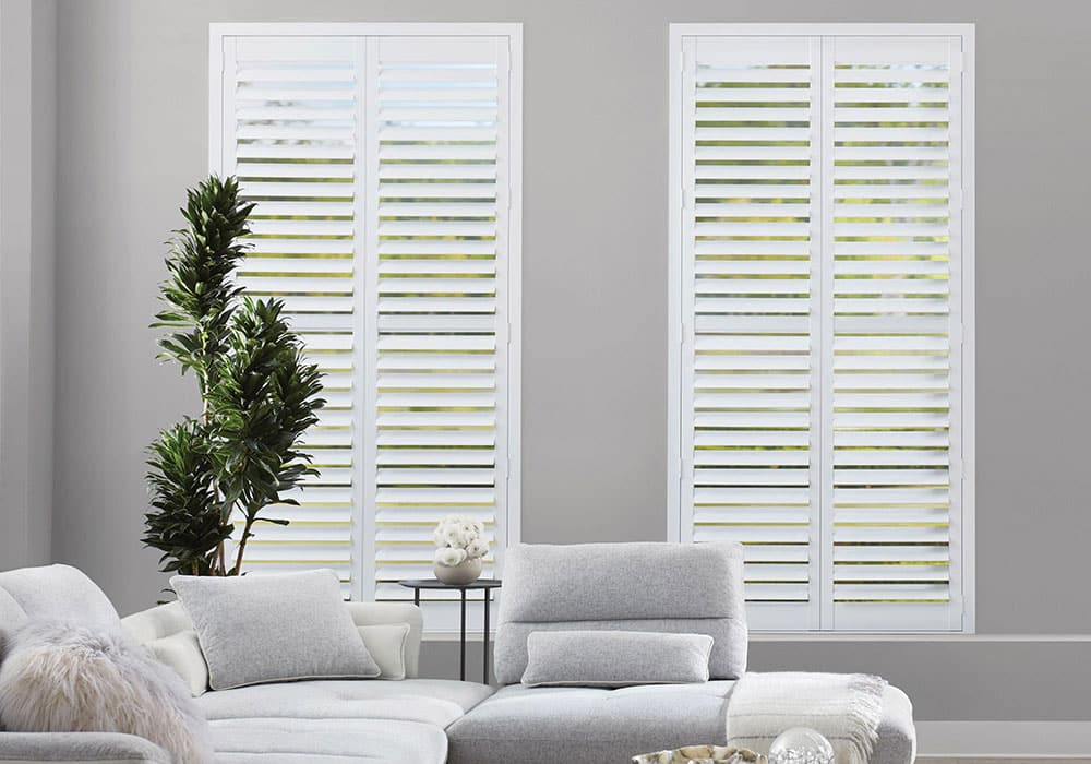 White shutters on living room windows